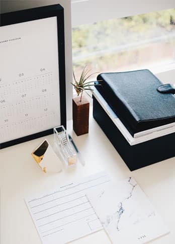 Desk With Notepads And Calendar